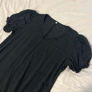 Black flowy dress with pockets.